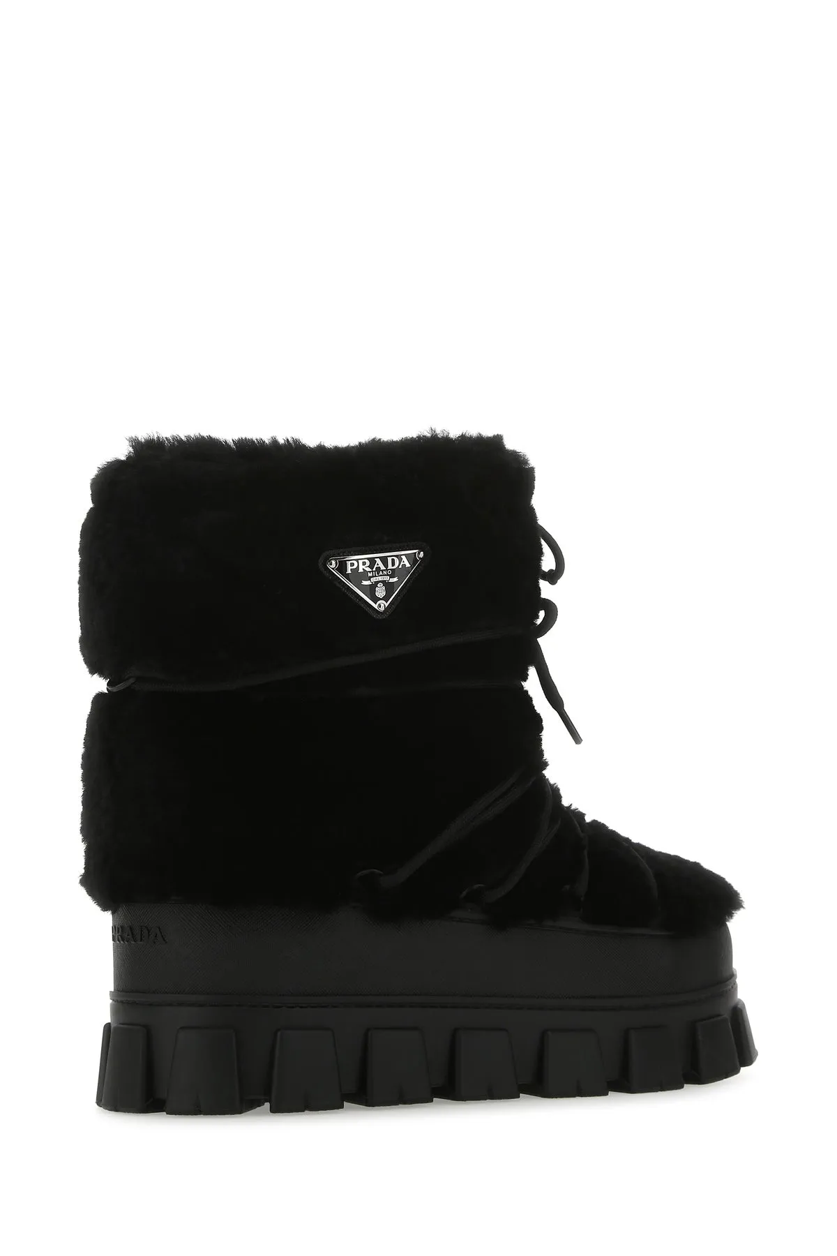Black shearling and rubber ankle boots