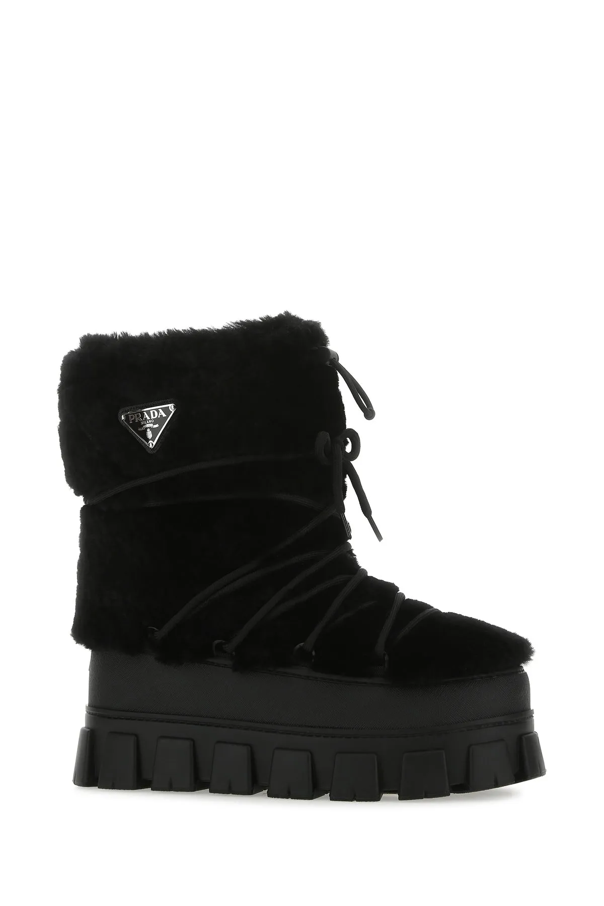 Black shearling and rubber ankle boots