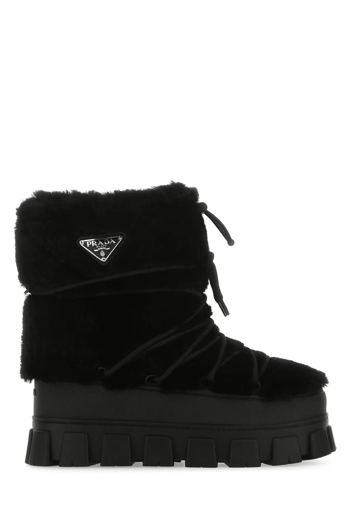 Black shearling and rubber ankle boots